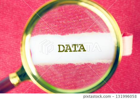 DATA word was found using a magnifying glass under a piece of paper. Business strategy success concept DATA word was found using a magnifying glass under a piece of paper. Business strategy success concept 131996058
