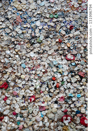 wall covered with colorful chewing gums 131996794