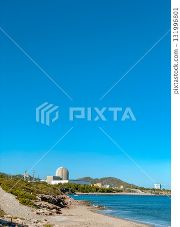 nuclear plant seen from La Almadrava beach, Spain 131996801