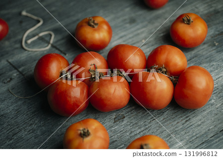 Spanish tomates de colgar on a rustic gray table 131996812