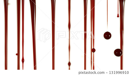 Freeze Motion of Photograph of Dripping Blood Forming Thin Streams and Scattered Droplets on a Clean White Background. Ideal for Horror, Medical, or Crime Related Visual Concepts. Realistic and Freeze Motion of Photograph of Dripping Blood Forming Thin Streams and Scattered Droplets on a Clean White Background. Ideal for Horror, Medical, or Crime Related Visual Concepts. Realistic and 131996910
