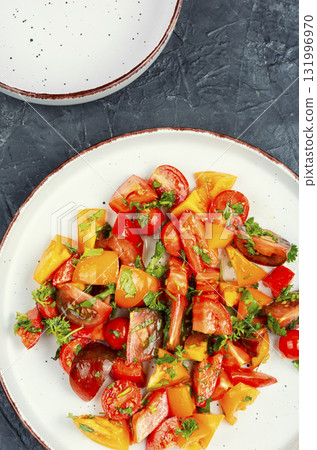 Fresh salad with tomatoes. Fresh salad with tomatoes. 131996970