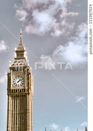 Big Ben, London, England, clock tower towering against the blue sky Big Ben, London, England, clock tower towering against the blue sky 131997024