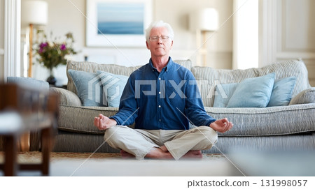 elderly man calmly meditating in living room lifestyle for blood pressure care 131998057