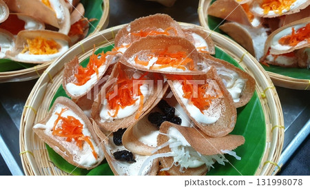 Thai Crispy Pancakes in Woven Baskets, Thai dessert, Thaifood. Thai Crispy Pancakes in Woven Baskets, Thai dessert, Thaifood. 131998078