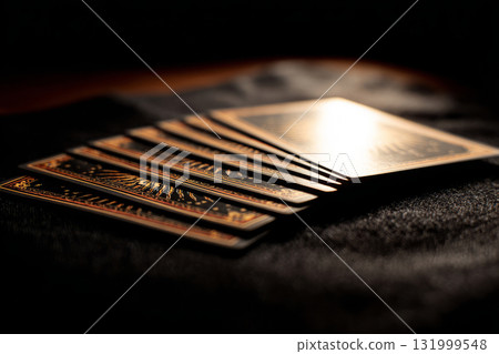 Tarot cards fanned out on black background 131999548