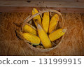 Freshly Boiled Sweet Corn in a Rustic Woven Basket 131999915