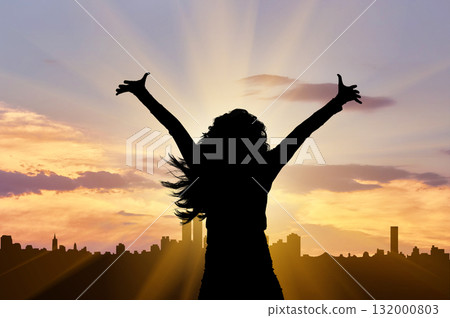 Silhouette of a happy and successful business woman 132000803