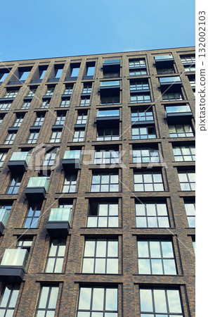 Architecture and real estate, modern residential apartment building with large panoramic windows 132002103