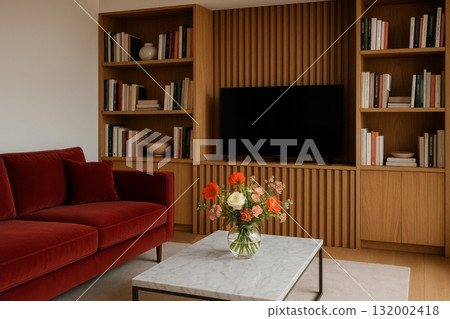 Cozy Living Room With Red Couch and Modern Decor Featuring Colorful Flower Arrangement 132002418