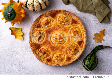 Halloween apple pie with scary faces Halloween apple pie with scary faces 132002506