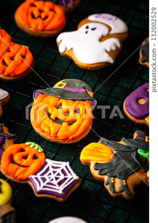 Halloween cookies in shape of ghost, jack-o-lantern and skull Halloween cookies in shape of ghost, jack-o-lantern and skull 132002529