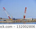 Autumn photo of a large crane at a wind turbine removal work base in Esashi, Hokkaido. 132002806