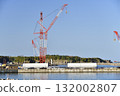 Autumn photo of a large crane at a wind turbine removal work base in Esashi, Hokkaido. 132002807