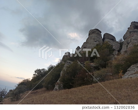 "Valley of ghosts" - mountain plateau on Demerjy mountain. sunset view from top point, 1239m. Crimea, Russia 132002836