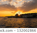 Sunset lit mosque seen from a boat on the Bosphorus, Istanbul, Turkey 132002866
