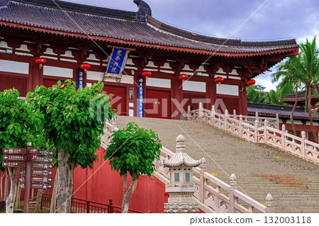 A traditional stone bridge with red lanterns in Nianshan Park, Sanya, Hainan, China. A traditional stone bridge with red lanterns in Nianshan Park, Sanya, Hainan, China. 132003118