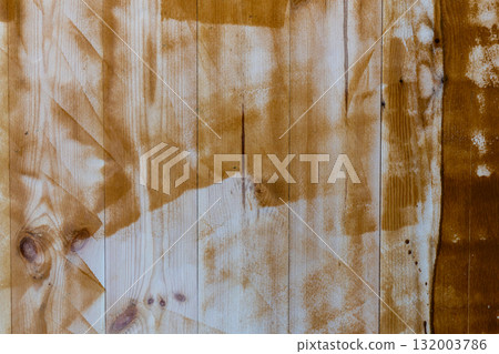 Textured wooden surface with knots and stains Textured wooden surface with knots and stains 132003786