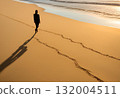 Human shadow cast gently across sandy ground.AI Generated 132004511