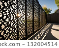 Woven metal mesh forming a grid fence structure.AI Generated 132004514