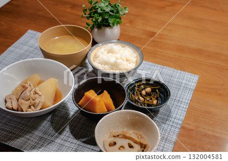 A Japanese-style home-cooked dinner featuring simmered chicken and radish and simmered pumpkin A Japanese-style home-cooked dinner featuring simmered chicken and radish and simmered pumpkin 132004581