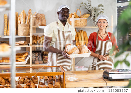 Positive bakers at counter Positive bakers at counter 132005367