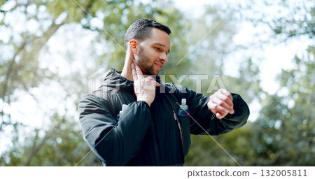 Man, pulse and exercise time in nature forest, woods and training workout and hiking. Athlete person, hiker or runner outdoor for fitness or trekking adventure with watch for progress or heart rate Man, pulse and exercise time in nature forest, woods and training workout and hiking. Athlete person, hiker or runner outdoor for fitness or trekking adventure with watch for progress or heart rate 132005811