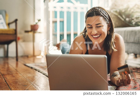Laptop, credit card and woman on floor in online shopping, e commerce and fintech, home payment or finance. Happy person relax on carpet, banking or website sale, discount or subscription on computer 132006165