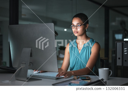 Computer reading, focus and African woman editing article for social media app, website or online web blog. Employee typing, late night research review and overtime journalist working on news post 132006331