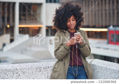 Black woman, city and texting with afro, smartphone ux and reading for social network chat. Urban gen z girl, african and phone for blog, post and networking on dating app on rooftop balcony in metro 132006368