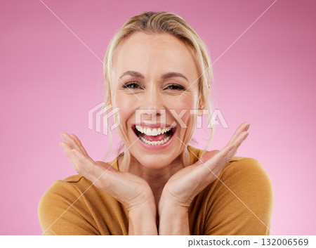 Excited portrait, woman and smile on pink background, studio and backdrop for celebration of happiness. Happy mature model, face and confidence to celebrate with motivation, success or surprise hands Excited portrait, woman and smile on pink background, studio and backdrop for celebration of happiness. Happy mature model, face and confidence to celebrate with motivation, success or surprise hands 132006569