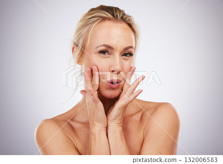 Portrait, skincare and senior woman with dermatology, beauty and texture on grey studio background. Face detox, mature female or lady with cosmetics, confident or morning routine for grooming or care 132006583