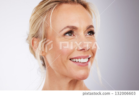 Beauty, face and skincare of woman in studio for cosmetic and anti aging dermatology. Happy mature aesthetic model thinking on grey background for self love, care and wellness facial glow mockup idea Beauty, face and skincare of woman in studio for cosmetic and anti aging dermatology. Happy mature aesthetic model thinking on grey background for self love, care and wellness facial glow mockup idea 132006603