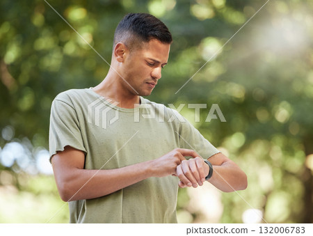 Fitness, time and man with watch in nature to check heart, running progress and notification. Sport, exercise and athlete runner reading health, pulse or tracking training on technology in Australia Fitness, time and man with watch in nature to check heart, running progress and notification. Sport, exercise and athlete runner reading health, pulse or tracking training on technology in Australia 132006783