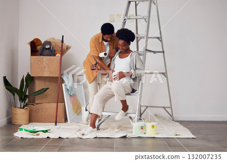 Painting, pregnancy or home with a black couple in DIY, renovation or house remodel with a paintbrush or roller. Teamwork, partners or African man and pregnant woman excited about baby or new family Painting, pregnancy or home with a black couple in DIY, renovation or house remodel with a paintbrush or roller. Teamwork, partners or African man and pregnant woman excited about baby or new family 132007235