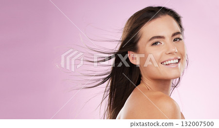 Hair care, beauty and portrait of a woman in a studio with a cosmetic, makeup and salon treatment. Happy, smile and female model with shiny and healthy hairstyle by pink background with mockup space. Hair care, beauty and portrait of a woman in a studio with a cosmetic, makeup and salon treatment. Happy, smile and female model with shiny and healthy hairstyle by pink background with mockup space. 132007500