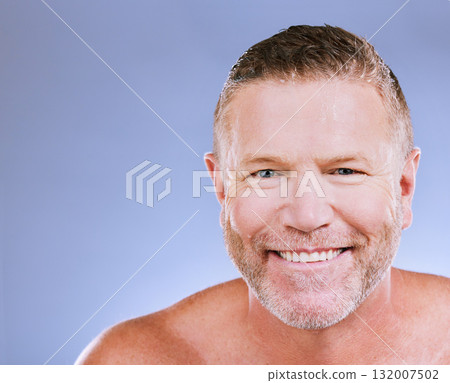 Skincare, man smile and portrait of a mature model in a blue background studio with mockup. Facial, cosmetics wellness and spa treatment of a senior person with happiness from self care cleaning Skincare, man smile and portrait of a mature model in a blue background studio with mockup. Facial, cosmetics wellness and spa treatment of a senior person with happiness from self care cleaning 132007502