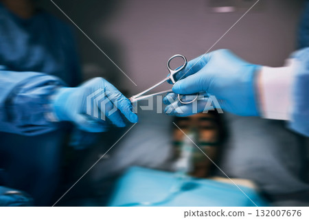 Hospital scissors, surgery and doctors hands in theatre for medical support, teamwork or patient with healthcare zoom. Doctor, nurse or surgeon team work, giving tools and helping in operating room Hospital scissors, surgery and doctors hands in theatre for medical support, teamwork or patient with healthcare zoom. Doctor, nurse or surgeon team work, giving tools and helping in operating room 132007676
