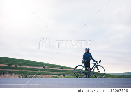 Sports, woman and bicycle in countryside with sky mockup, athlete and thinking of cardio training goals. Female cyclist, bike and fitness with copy space, freedom and cycling performance in triathlon Sports, woman and bicycle in countryside with sky mockup, athlete and thinking of cardio training goals. Female cyclist, bike and fitness with copy space, freedom and cycling performance in triathlon 132007708
