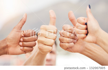 Closeup of people, hands and thumbs up for teamwork, collaboration and agreement of solidarity together. Diversity, community and group with hand sign for thank you, trust and review with like emoji Closeup of people, hands and thumbs up for teamwork, collaboration and agreement of solidarity together. Diversity, community and group with hand sign for thank you, trust and review with like emoji 132007805