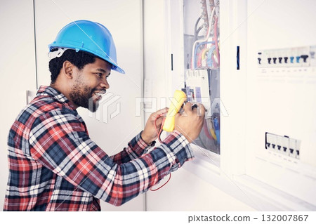 Electrician multimeter, electric switch box and happy man check cable current, wire fuse or measure voltage power supply. Circuit maintenance inspection, African person and technician fix electricity Electrician multimeter, electric switch box and happy man check cable current, wire fuse or measure voltage power supply. Circuit maintenance inspection, African person and technician fix electricity 132007867