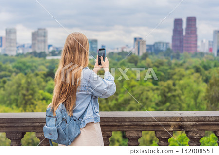 Young woman tourist standing near Chapultepec Castle in Mexico City, exploring the historic landmark. Solo travel, cultural heritage, tourism, and adventure concept Young woman tourist standing near Chapultepec Castle in Mexico City, exploring the historic landmark. Solo travel, cultural heritage, tourism, and adventure concept 132008551