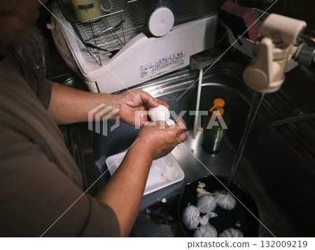 Cooking in the kitchen Cooking in the kitchen 132009219