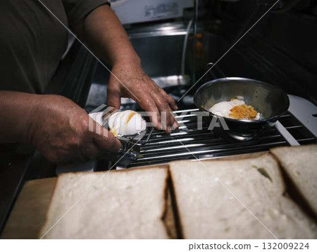 Cooking in the kitchen Cooking in the kitchen 132009224