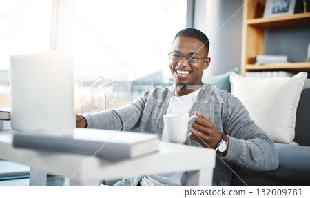 Computer, home portrait and man with coffee for online education, college e learning and studying in living room. Happy african person on floor, tea and laptop for remote university or scholarship 132009781