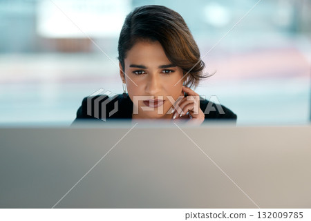 Business woman, computer and thinking, reading or online management for software data, review or solution in office. Planning, focus and problem solving of professional worker or person on desktop pc 132009785