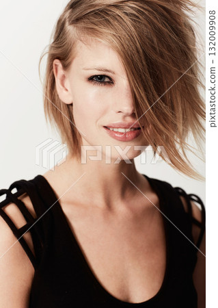 Edgy, smile and portrait of a woman with a hairstyle from salon isolated on a white background in a studio. Happy, punk and a young hair model showing a trendy, fashionable and beautiful style Edgy, smile and portrait of a woman with a hairstyle from salon isolated on a white background in a studio. Happy, punk and a young hair model showing a trendy, fashionable and beautiful style 132009908