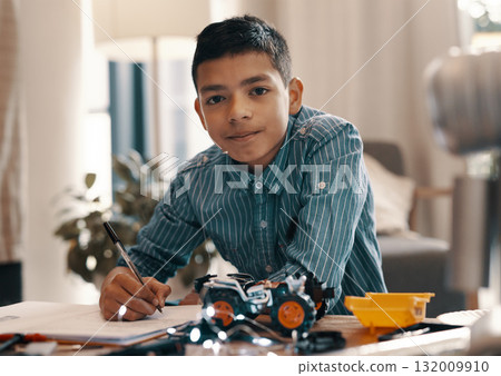 Learning, writing and portrait of kid with robotics homework, homeschool and science for tech project. Taking notes, car robot and boy child with knowledge, education and studying in house alone. Learning, writing and portrait of kid with robotics homework, homeschool and science for tech project. Taking notes, car robot and boy child with knowledge, education and studying in house alone. 132009910