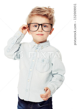 Nerd or geek, portrait of young child with glasses and in white background. Intelligent or smart, serious and isolated child adjusting his spectacles as a confident student in a studio backdrop 132009931