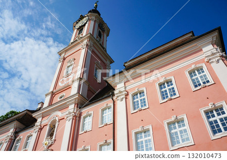 A cute building with a pink exterior in a German city 132010473